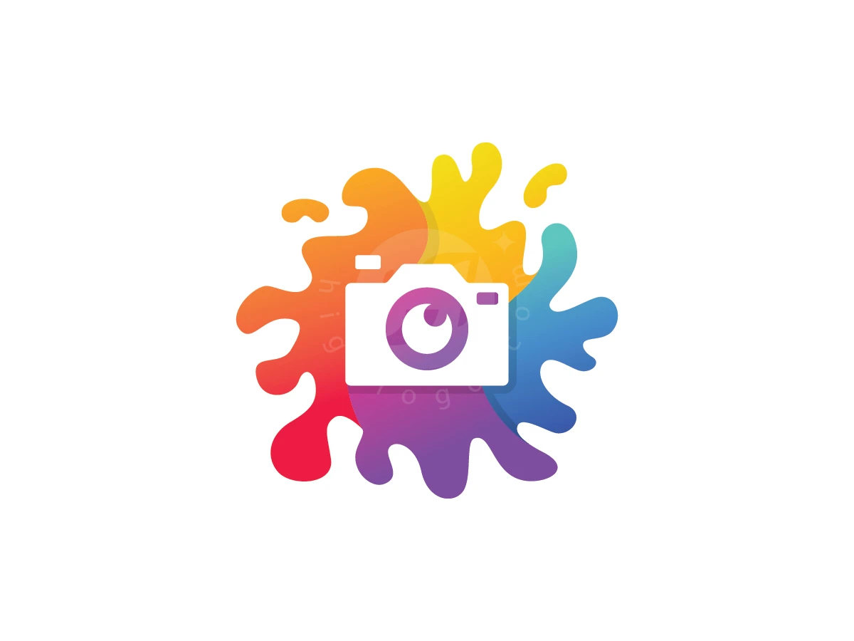 Colorful Splatter Camera Gear Logo, Splashes of rainbow-colored paint explode behind a white camera icon, centered on a clean white background.
